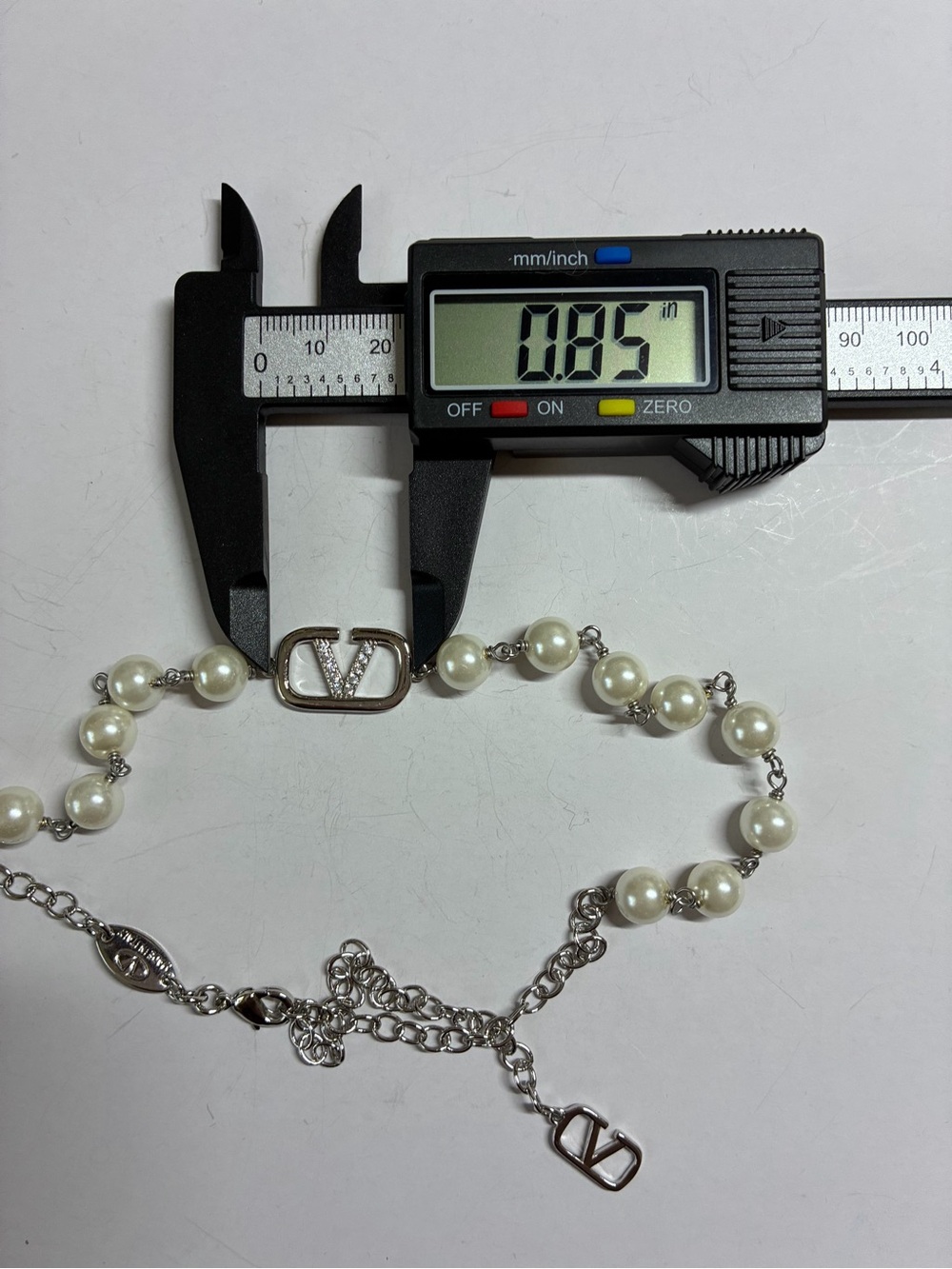 Silver and White Pearl Valentino V-Emblem Necklace - Picture 9 of 11